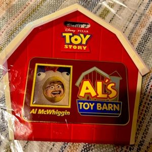 Disney Jumbo Pin Al’s Toy Barn Name Badge